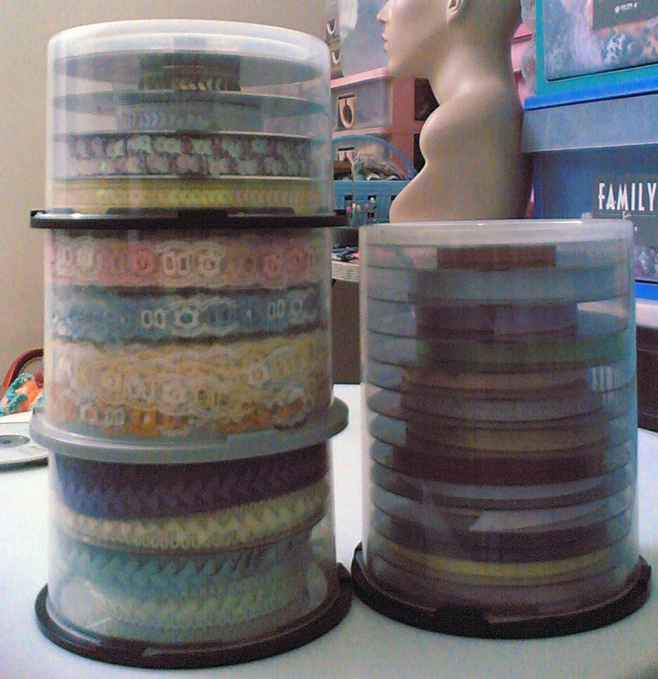 CD containers are good way to store your lace and ribbon samples, don't forget to slide a CD between layers.